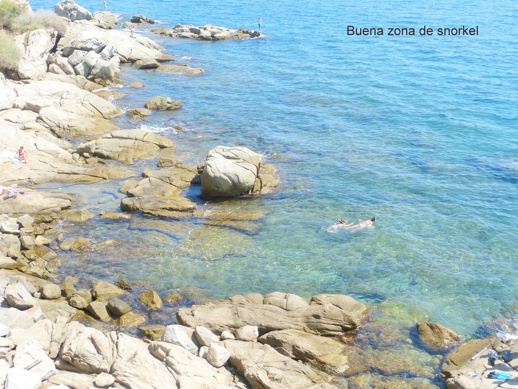 Апартаменты Roses Sobre El Mar Номер фото