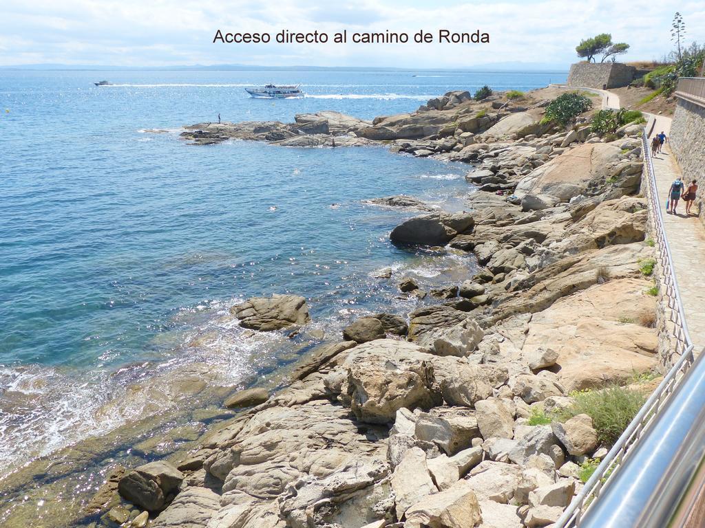Апартаменты Roses Sobre El Mar Номер фото